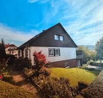 Einfamilienhaus mit vermieteter Dachgeschosswohnung - Körle