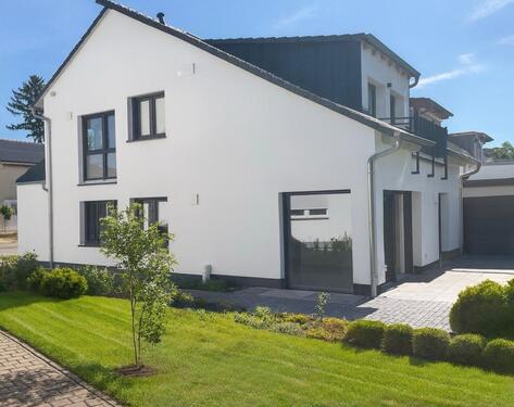 Foto - Neubau mit Garten auf zwei Ebenen – Erstbezug im Effizienzhaus 40