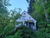 Foto - Einfamilienhaus mit Sanierungsbedarf, großem Grundstück in 69250