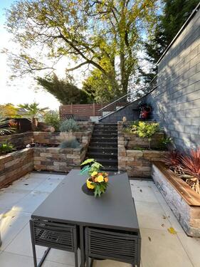 Foto - Schöne Terrassenwohnung mit großen Pflanzbeeten
