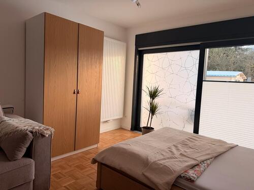 Foto - Modernes 1-Zimmer Apartment Ferienwohnung