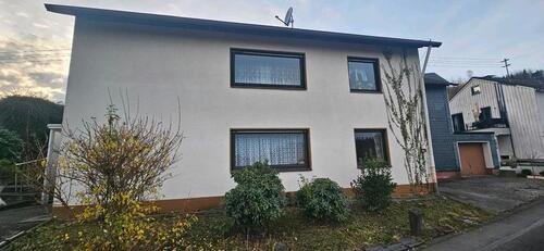 Foto - Einfamilienhaus mit Einliegerwohnung