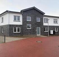 Neubau 2 Zimmer Obergeschosswohnung mit Fahrstuhl, Balkon und EBK - Harpstedt