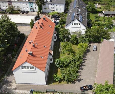 Foto - Mehrfamilienhaus 8 Wohnungen 5 Garagen