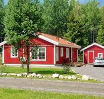 Rot-weißes Ferienhaus 