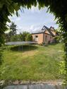 Foto - Gepflegtes, grundsaniertes Einfamilienhaus mit gewerbl. Amnbau