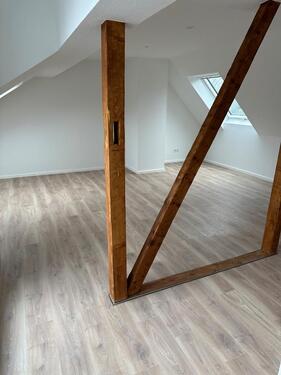 Foto - Moderne Dachgeschosswohnung mit Loggia