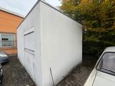 Foto - Kleines, schlichtes Bürogebäude