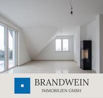 Modernes Wohnen im Dachgeschoss – Neubau mit Kamin und großem Balkon - Hiddenhausen