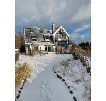 Ferienwohnung Westwind auf Fehmarn - Meerblick, Kamin & Sauna