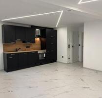 Bollendorf: Charmante 2-Zimmerwohnung im Erdgeschoss mit Einbauküche und Terrasse