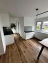 Foto - Moderne 2-Zimmer-Einliegerwohnung mit Kamin und Terrasse – 70 m²