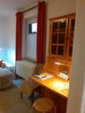 Foto - Eine Wohnung mit Dusche, kleine Terrasse und zwei Pkw Stellplätze