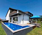 Foto - Einfamilienhaus mit Pool & Einliegerwohnung. Kaufpreis Immobilie: