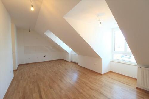 Foto - Mit Einbauküche: Moderne 2-Zimmer-Dachgeschosswohnung