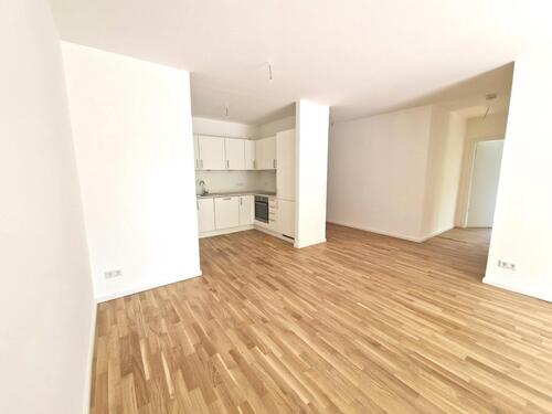 Foto - Luxuriöser Neubau mit Terrasse & offener Küche – 3 Zimmer mit grünem Ausblick