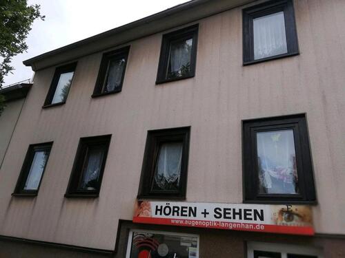 Foto - 2 Familien Haus mit Ladengeschäft und kleinen Garten