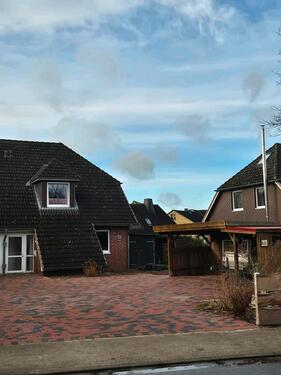 Foto - Doppelhaushälfte mit Carport und Garten