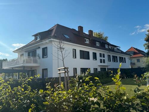 Foto - Moderne 3,5-Zimmerwohnung mit Carport