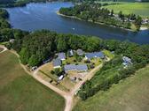 Foto - Ferienhaus am See mit Steg, Sauna, Floß, Motorboot, SuB, Kanu