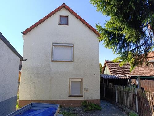 Foto - Einfamilienwohnhaus renovierungsbedürftig mit kleinem Grundstück