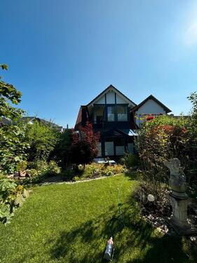 Foto - Traumhaus mit zwei Wintergärten, Kamin und idyllischem Garten