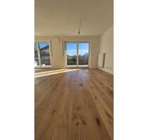 Exklusiver Erstbezug: EG-Wohnung mit wundervollem Erker, riesiger Hochterrasse und Südgarten - Oberaudorf