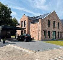 Großzügige Neubau-Obergeschosswohnung mit Einbauküche und Balkon zu vermieten - Papenburg