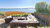 Foto - Ferienhaus Seaside an der SchleiOstsee 4 Personen 2 Schlafzimmer 2 Bäder Gäste-WC Kamin Infrarotkabine Holzterrasse Wintergarten Balkone Garten mit Wasseranbindung Strand Meer