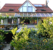 Großzügige 5-Zimmer-Wohnung mit Garten, Wintergarten & Terrasse - Grolsheim