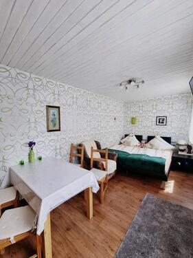 Foto - Eine gemütliche Ferienwohnung mit einer Terrasse und Blick auf