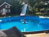 Foto - Sehr gemütliches Holzhaus, 330 qm, Pool, Solar, Sauna, Top-Lage