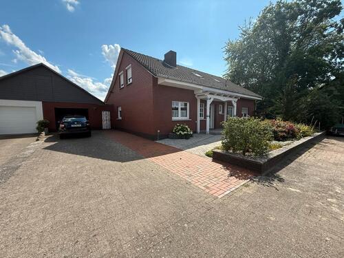 Foto - Attraktives Zweifamilienhaus in Dinklage zu verkaufen mit Baugrü.