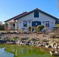 Bungalow mit Carport und idyllischem Traumgarten - Gnarrenburg