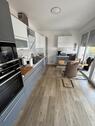 Foto - Teilmöblierte und neuwertige 3-ZKB-Wohnung