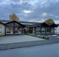 Burgsolms: Gewerbeimmobilie mit großzügigem Lager- und Bürobereich