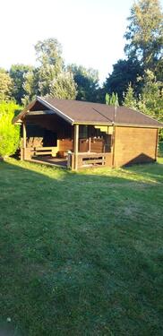 Foto - Schrebergarten mit Holzblockhaus