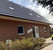 Gemütliche 2-Zimmer-Wohnung im Souterrain in zentraler Lage von Hohenlockstedt!