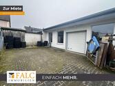 Foto - gepflegte ruhige Halle mit Rolltor und Außenstellplätzen