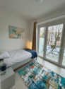 Foto - Modernes 1-Zimmer-Apartment mit Balkon und Fußbodenheizung