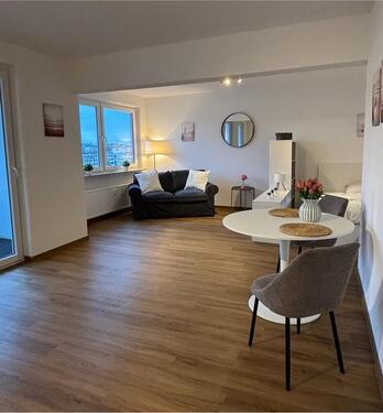 Foto - Moderne 1-Zi.-Wohnung mit Balkon, Aufzug & traumhaftem Weitblick