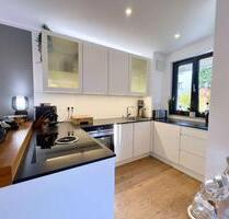 2-Zimmer Erdgeschosswohnung mit Garten und Garage in Bogenhausen - München