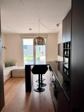 Foto - Moderne Erdgeschosswohnung mit Terrasse, Garten und Tiefgarage