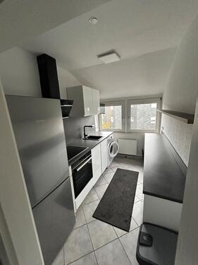 Foto - Top gepflegte 2 Zimmer Dachgeschosswohnung