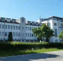 Lichtdurchflutetes Büro mit großer Dachterrasse über den Dächern Rosenheims