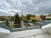 Foto - Lichtdurchflutete 3-Zimmer-Dachgeschosswohnung mit Dachterrasse