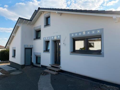 Foto - Energieeffizientes Einfamilienhaus mit Einliegerwohnung