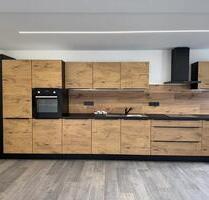 Bollendorf: Moderne, kernsanierte 3-Zimmerwohnung im 1. OG mit Einbauküche, Terrasse u. Garage