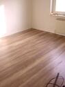 Foto - Renoviertes Zimmer mit Laminat 12 m2