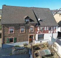 Einfamilienhaus mit viel po­ten­zi­al - Haus zu verkaufen - Lösnich